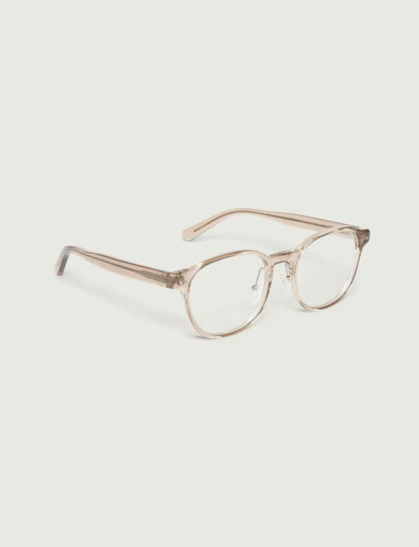 Lunette avec monture translucide signée Oliver Peoples